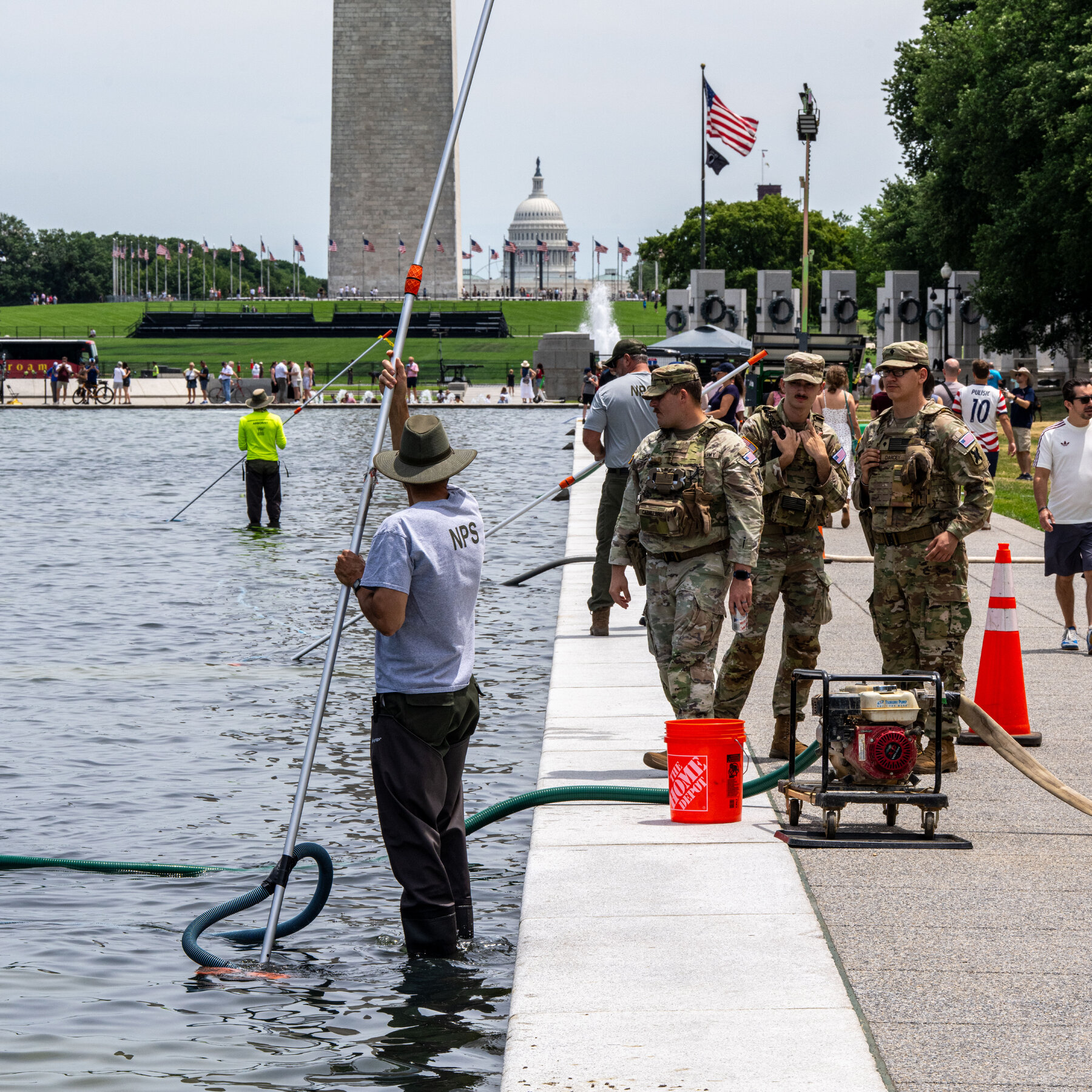 Reflecting Pool's New Coating Faces Challenges Amidst Algae Bloom