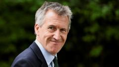 UK Defence Secretary Attends NATO Meeting Amidst Unresolved Spending Plan